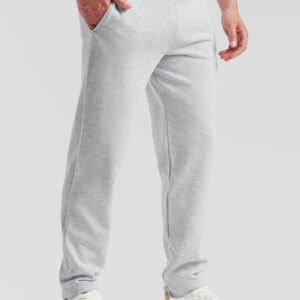 Uomo con pantaloni tuta grigi personalizzabili, ideali per abbigliamento promozionale e brand aziendali. Stampa online.